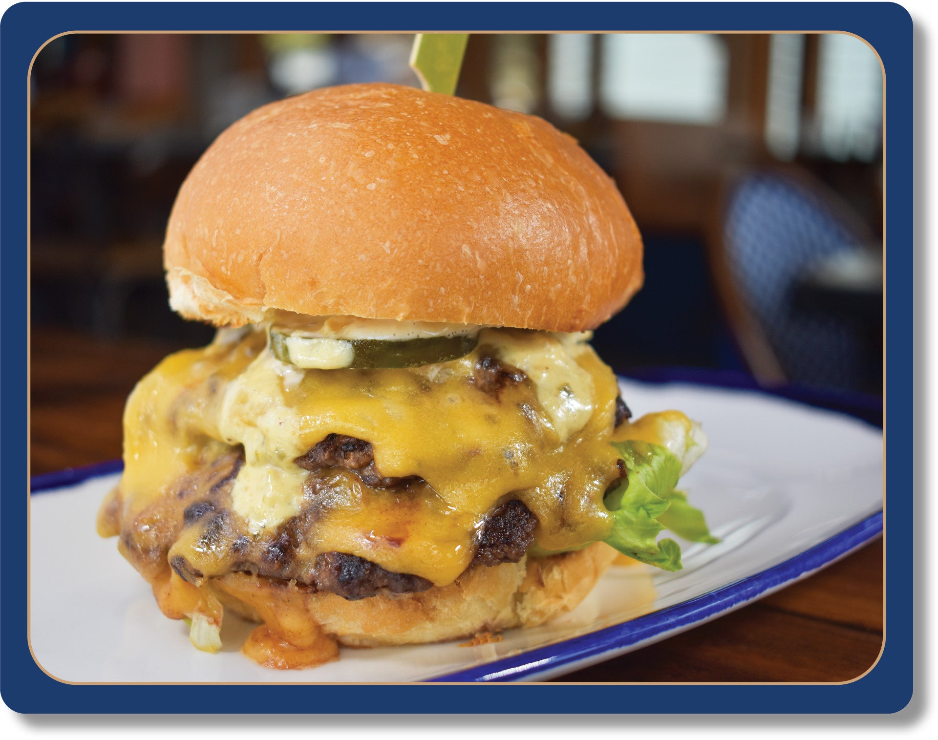 Double Mountain Cheeseburger: Two 4 oz. House Ground Oregon Natural Grass Fed Beef Patties, Mountain Burger Sauce, Iceberg Lettuce, House-Made American Cheese, Pickles, Toasted Big Ed’s Potato Bun