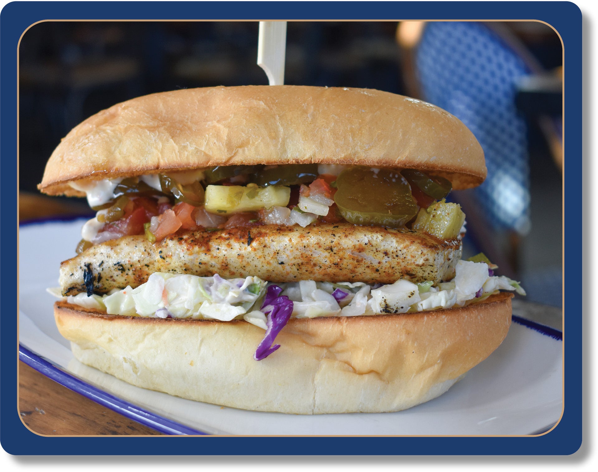 Paradise Sando: Grilled Mahi Mahi Filet, Pineapple Salsa, Slaw, Cadied Jalapenos, Sweet Chili Aioli, Potato Hoagie