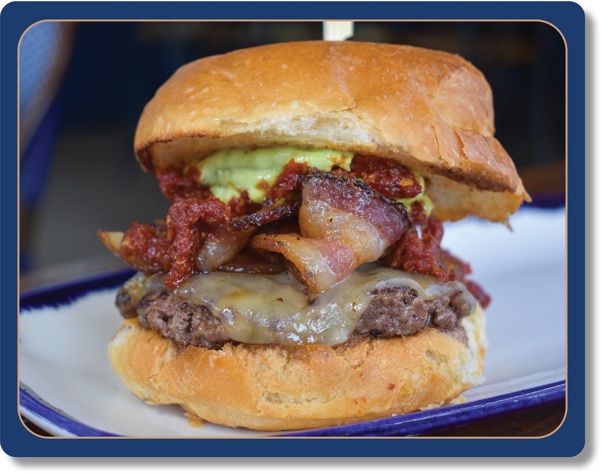 4oz Natural 100% Grass Fed Beef Patty, Aged White Cheddar, Sun-Dried Tomatoes, Bacon, Pesto Aioli