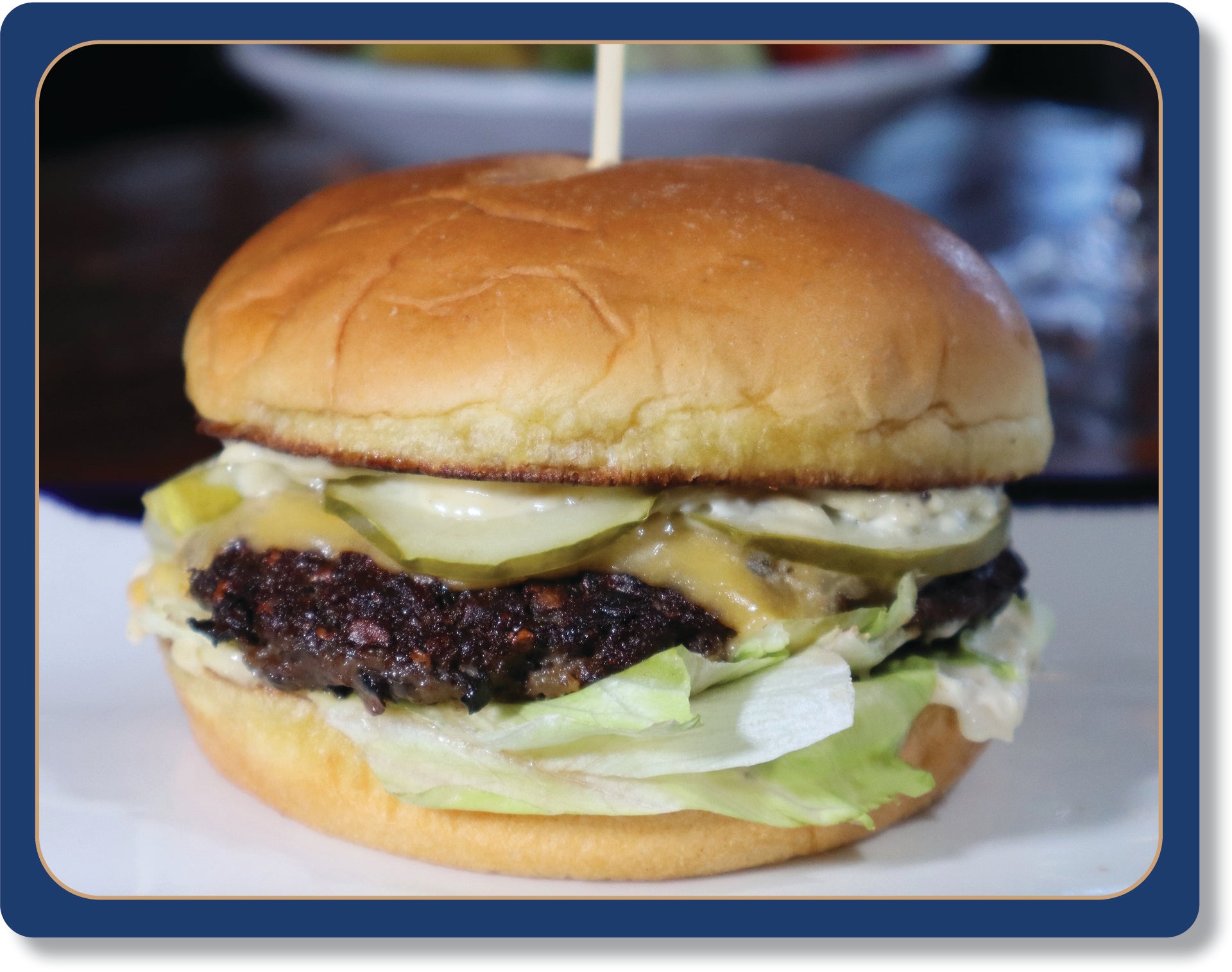 The 50/50 Burger
House-Made 50% Beef and 50% Plant Based Patty, Mountain Sauce, House-Made American Cheese, Iceberg Lettuce, Pickles.